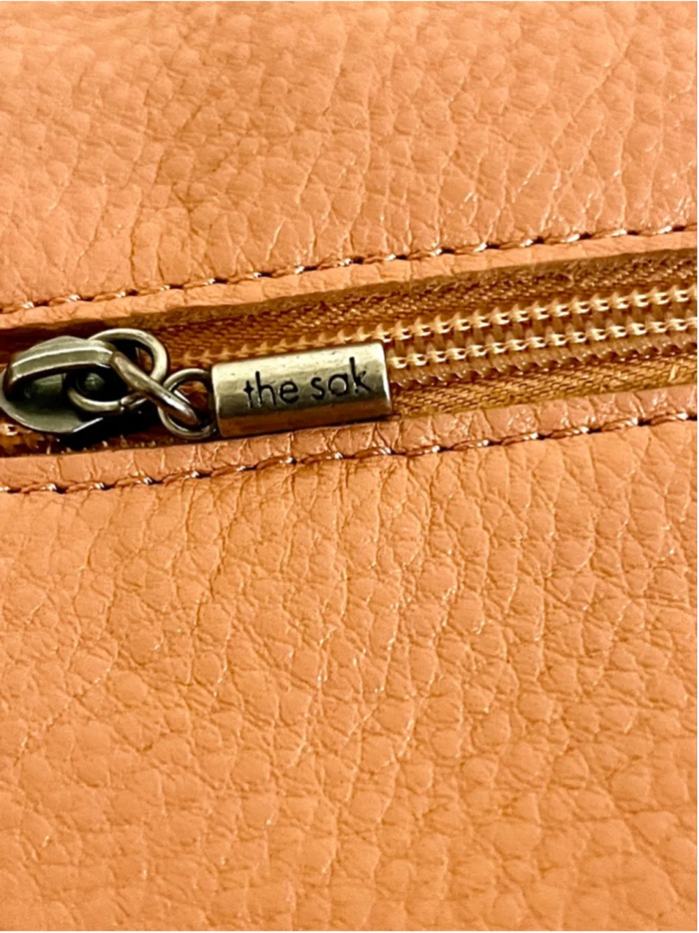 The Sak Jasmine orange leather hobo crossbody bag